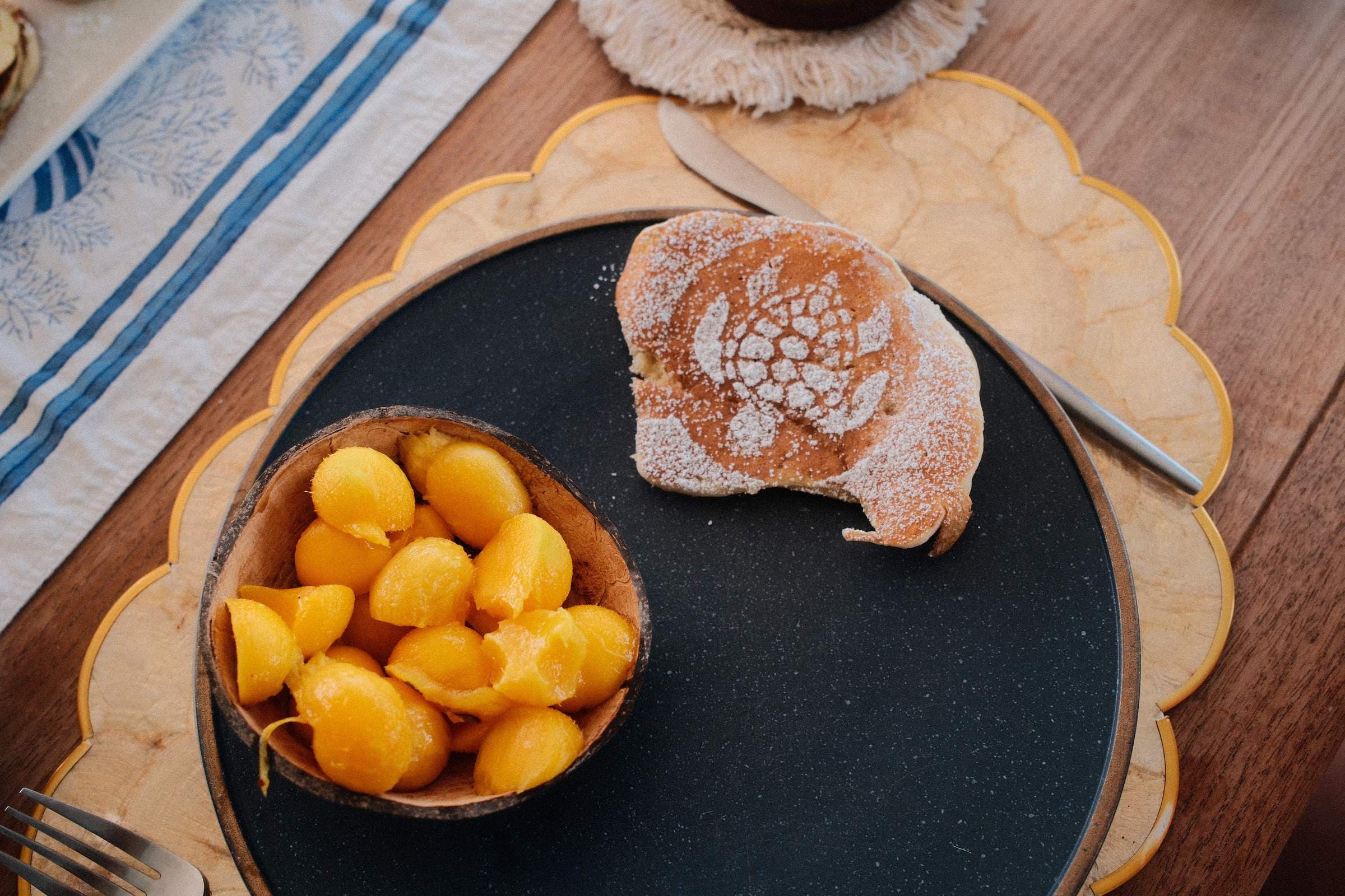 Turtle-stencil pancake flat-lay — first morning breakfast