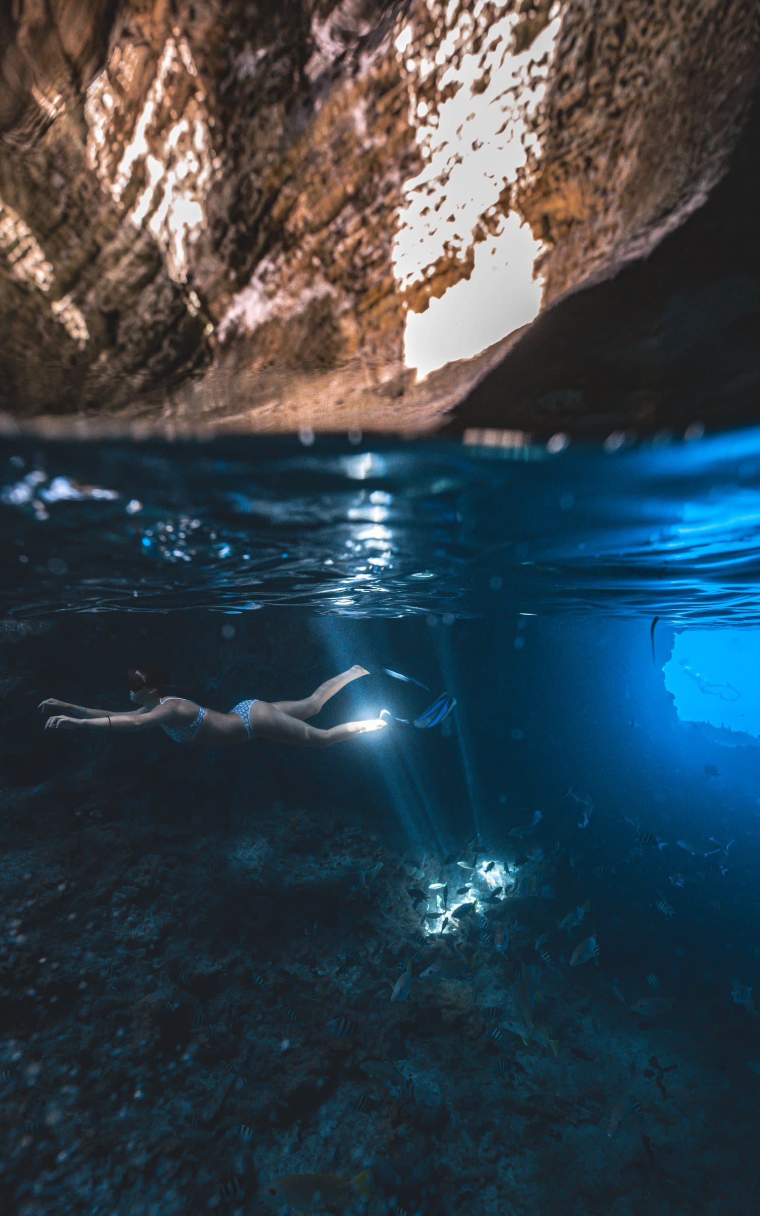 Thunderball Grotto — cave, flashlight, fish, stalactites