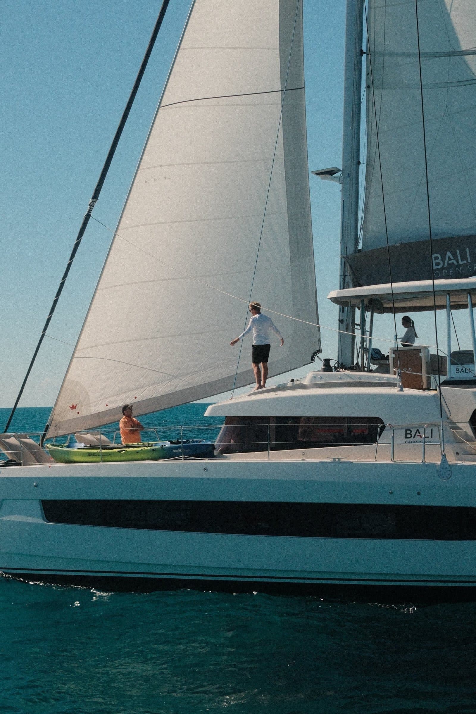 Luna with crew and guests, wide composition