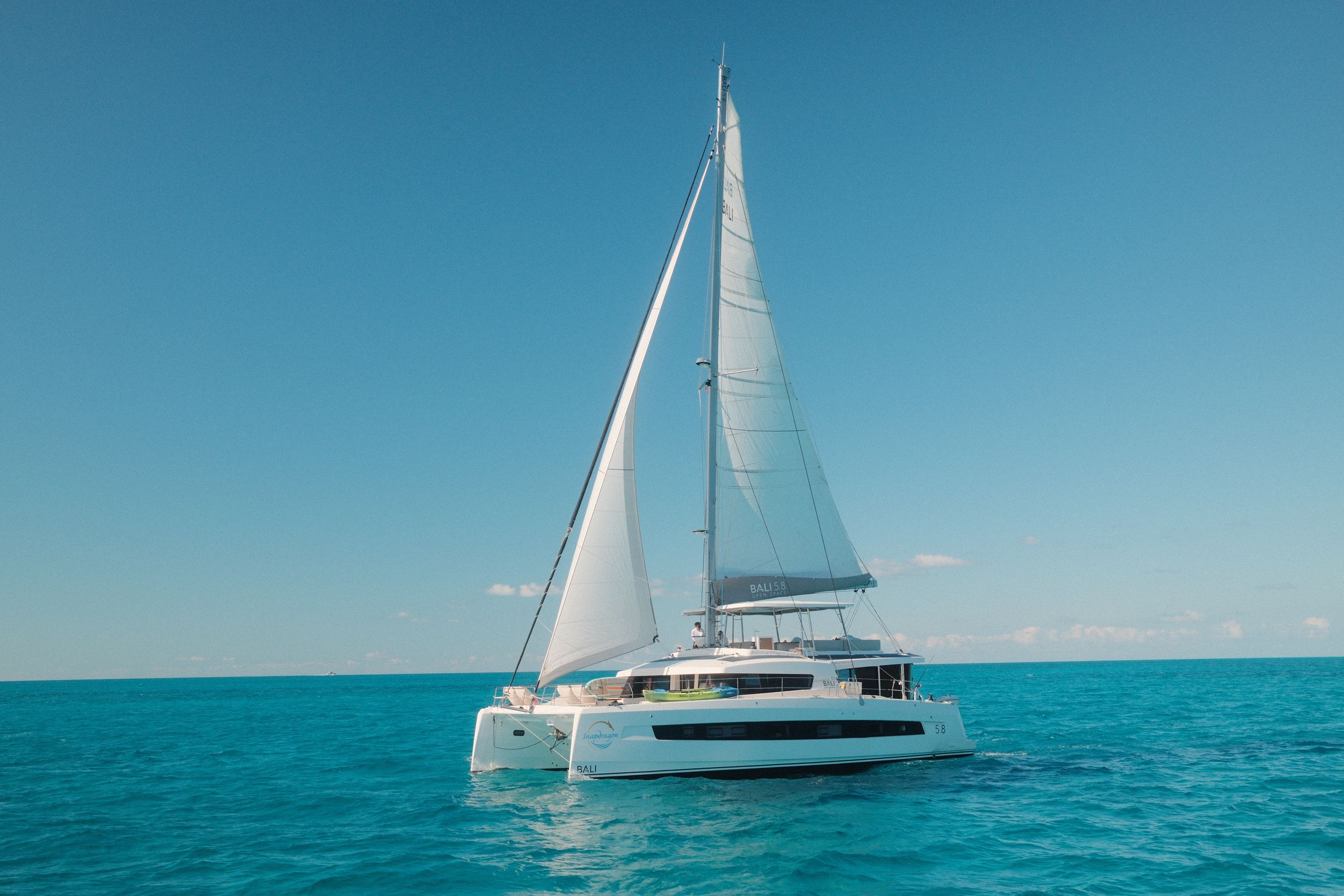 Luna — 2026 Bali 5.8 sailing catamaran under full sail in the Exumas