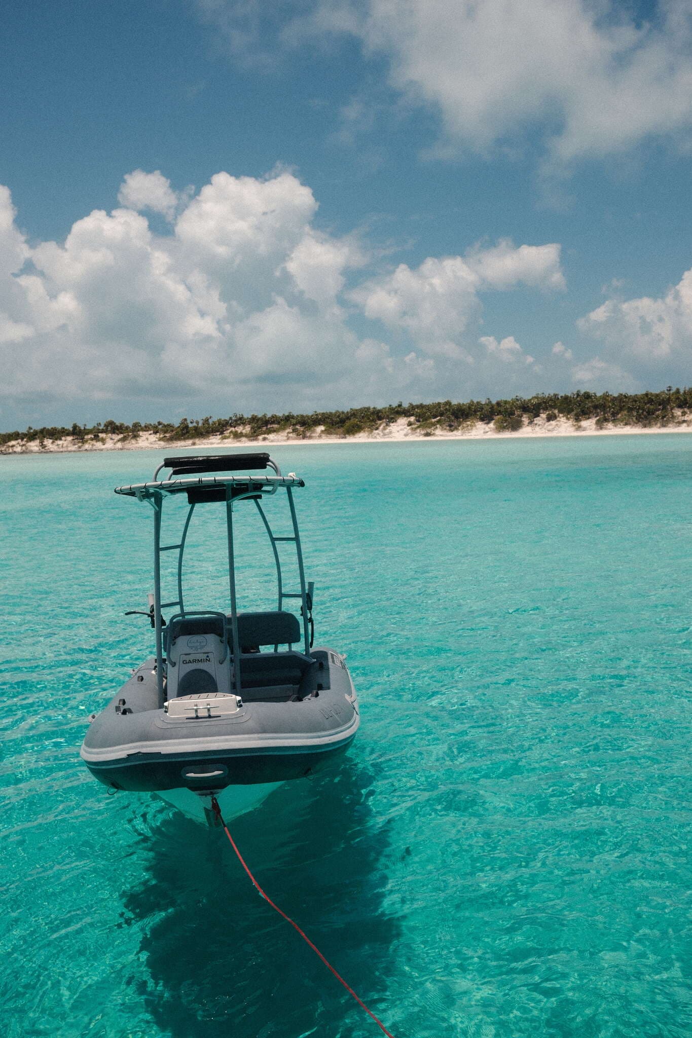 Garmin RIB tender on crystal water — Bahamian operations